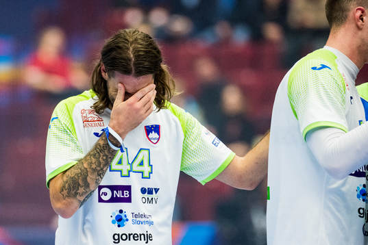 Dean Bombac of Slovenia looks dejected
