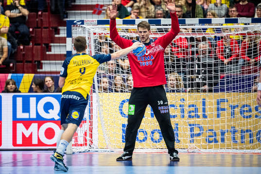 Jerry Tollbring of Sweden and goalkeeper Torbjørn Bergerud