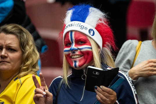 A supporter of Norway celebrates