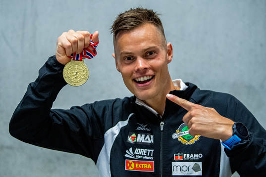 Håvard Haukenes of Norway poses with his gold medal