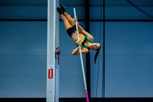 Birgitte Kjuus of Norway competes to win the women’s pole