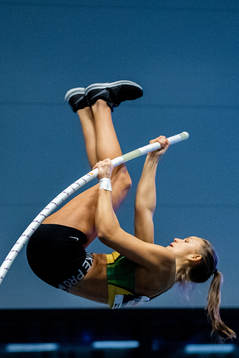 Birgitte Kjuus of Norway competes to win the women’s pole