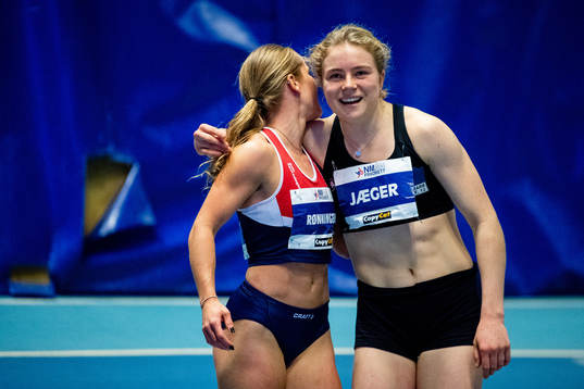 Helene Rønningen and Henriette Jæger of Norway celebrate