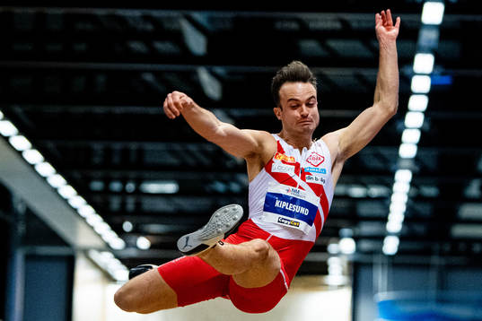 Ingar Kiplesund of Norway competes to win the men's long