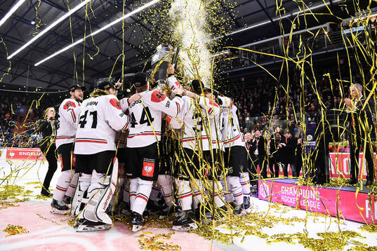 Players of Frölunda celebrate with the trophy