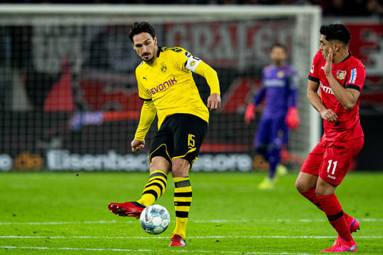 Mats Hummels of Borussia Dortmund and Nadiem Amiri of Bayer