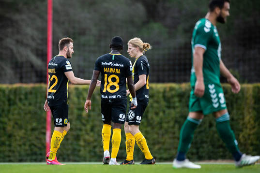 Muamer Tankovic of Hammarby celebrate with teammates