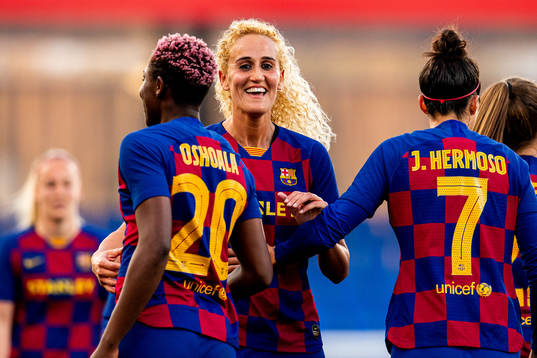 Asisat Oshoala of Barcelona celebrates with teammate Kheira