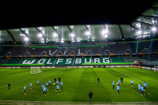 The team warms up