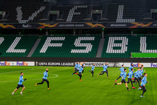 The team warms up