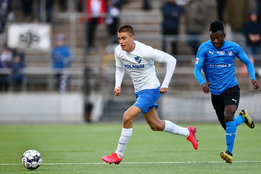 IFK Norrköpings Carl Björk och Halmstads Thomas Boakye