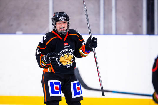 Spelare från Göteborgs HC jublar