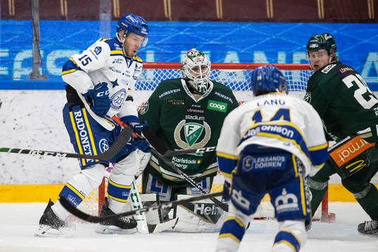 Leksands Matt Carey  och Färjestads målvakt Arvid Holm
