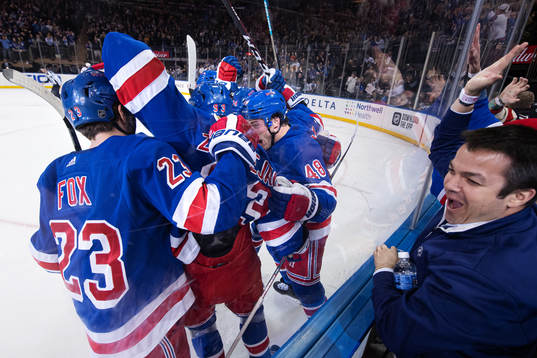 New York Rangers Mika Zibanejad celebrates with teammates