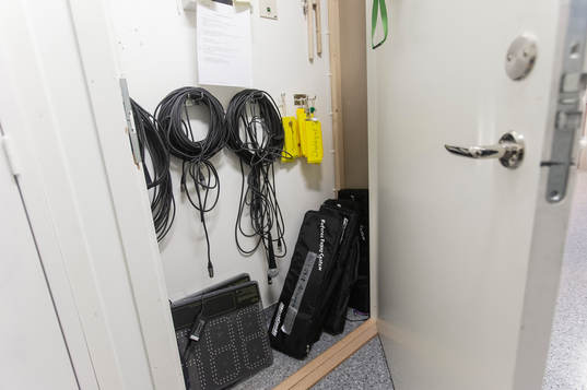 Timekeeping devices inside a storage space at Behrn Arena