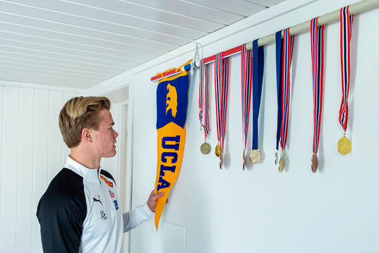 Norwegian pole vaulter Sondre Guttormsen checks out some