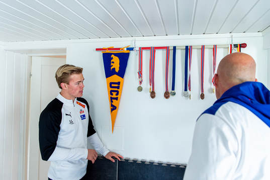 Norwegian pole vaulter Sondre Guttormsen checks out some