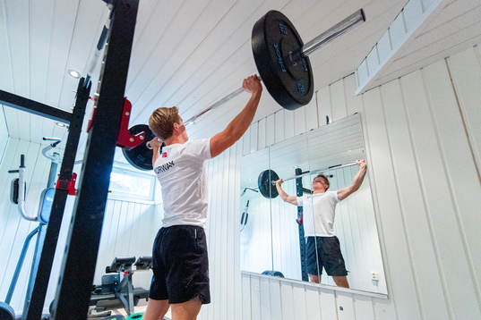 Norwegian pole vaulter Sondre Guttormsen trains at home as