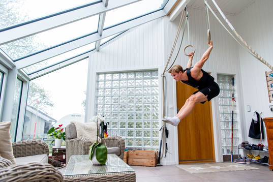 Norwegian pole vaulter Sondre Guttormsen trains at home as