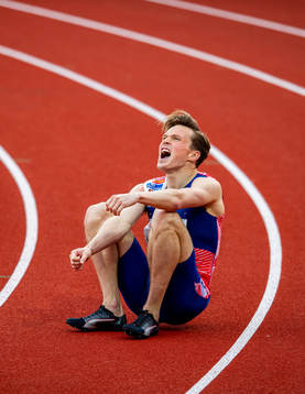 Karsten Warholm of Norway celebrates