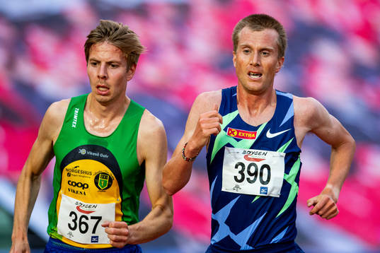 Per Svela and Sondre Nordstad Moen of Norway compete in the