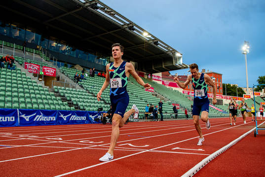 Jakob Ingebrigtsen and Filip Ingebrigtsen compete to finish
