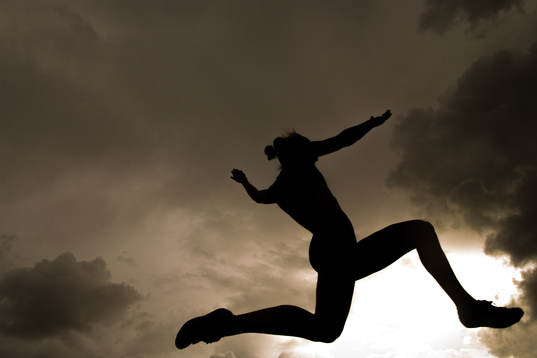 The silhouette of Anna Garnes Kleven competing in the