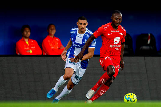 Mohamed Ofkir of Sarpsborg and Gilbert Koomson of Brann