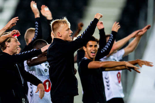 Kasper Lunding Jakobsen and teammates of Odd celebrate