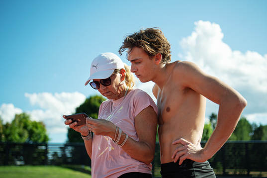 Swedish pole vaulter Armand Duplantis looks at video of a