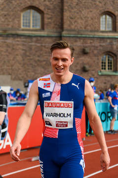 Karsten Warholm of Norway celebrates