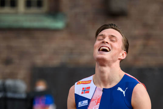 Karsten Warholm of Norway celebrates
