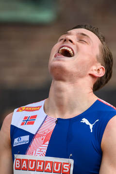 Karsten Warholm of Norway celebrates