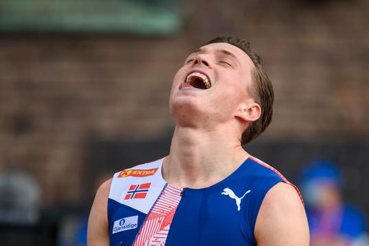 Karsten Warholm of Norway celebrates