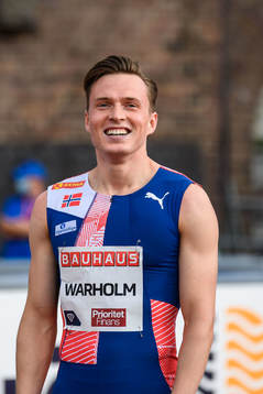 Karsten Warholm of Norway celebrates