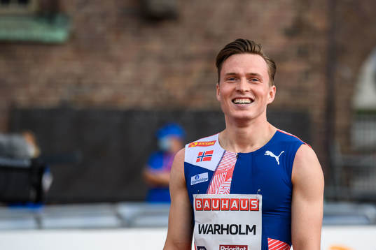 Karsten Warholm of Norway celebrates