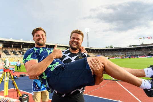 Simon Pettersson and Daniel Ståhl of Sweden celebrates
