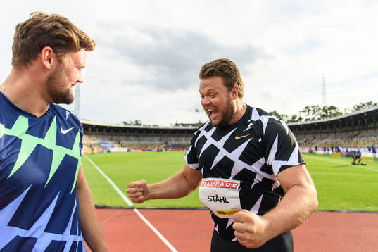 Simon Pettersson and Daniel Ståhl of Sweden celebrates