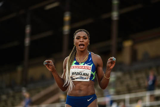 Caterine Ibarguen of Colombia celebrates when competing in