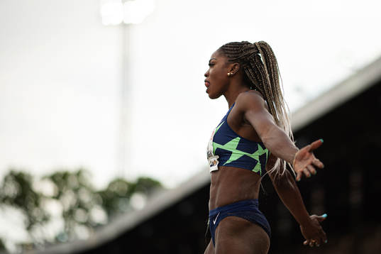 Caterine Ibarguen of Colombia celebrates when competing in