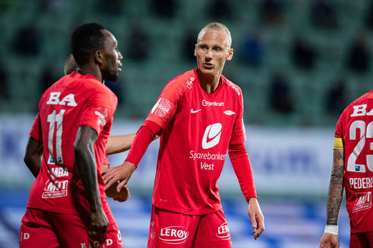 Kristoffer Barmen of Brann celebrates with teammates