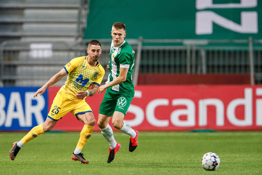 Zsolt Nagy of Puskas and Aron Johansson of Hammarby