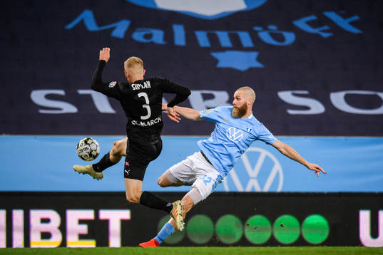 Jo Inge Berget of Malmö FF and Michal Siplak of Cracovia