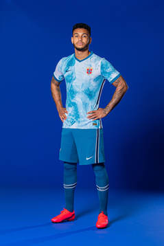 Joshua King of the Norwegian national football team poses