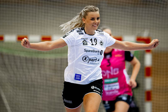 Celina Vatne of Flint celebrates