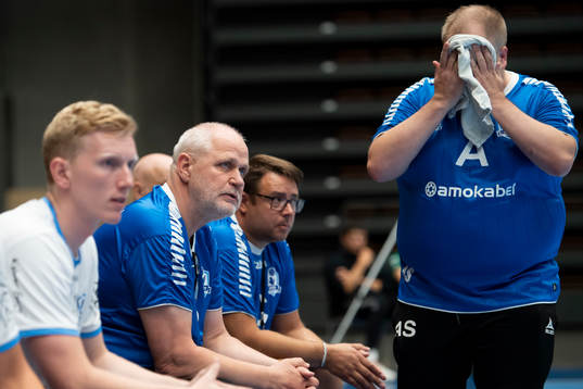Amos tränare Andreas Stockenberg och assisterande tränare