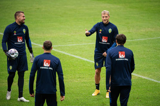 Goalkeeper Kristoffer Nordfeldt and John Guidetti of the