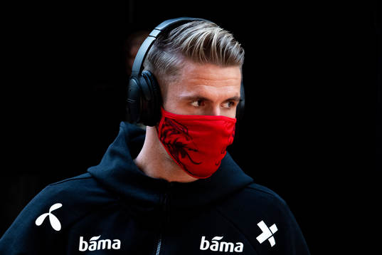 Kristoffer Ajer of Norway arrives wearing a face mask