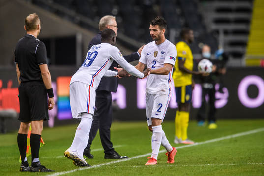 Ferland Mendy changes with Léo Dubois of France