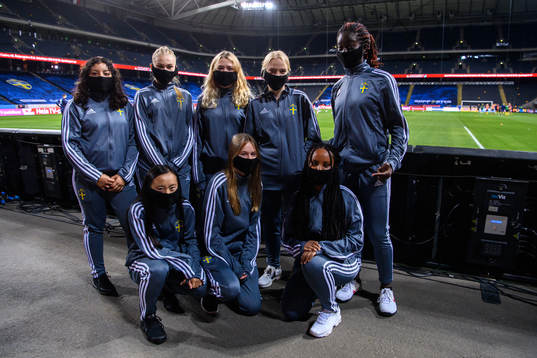 Ball girls pose for a group photo